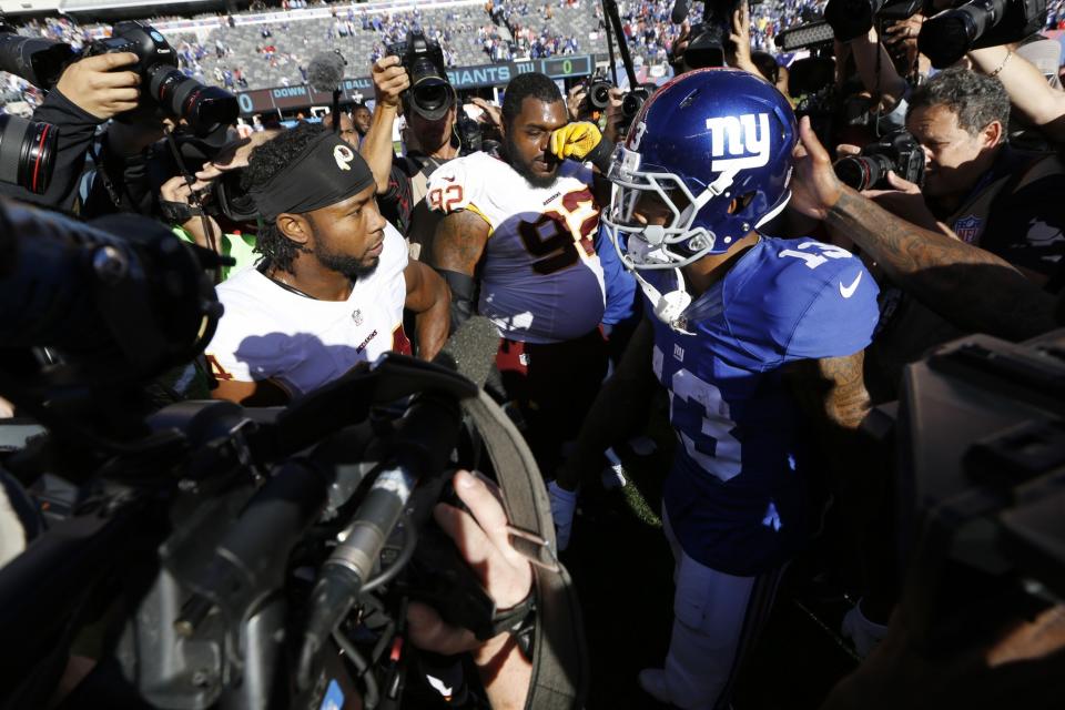 josh Norman, left, and Odell Beckham Jr. were not the main stories Sunday as the Giants lost to the Redskins (AP).