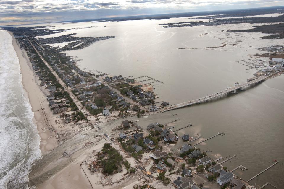 Mantoloking - Two new inlets from the ocean to the bay formed in Mantoloking due to Hurricane Sandy, one directly opposite the Mantoloking Bridge. Peter Ackerman/Asbury Park Press - 10/31/12 - aftermath121031a