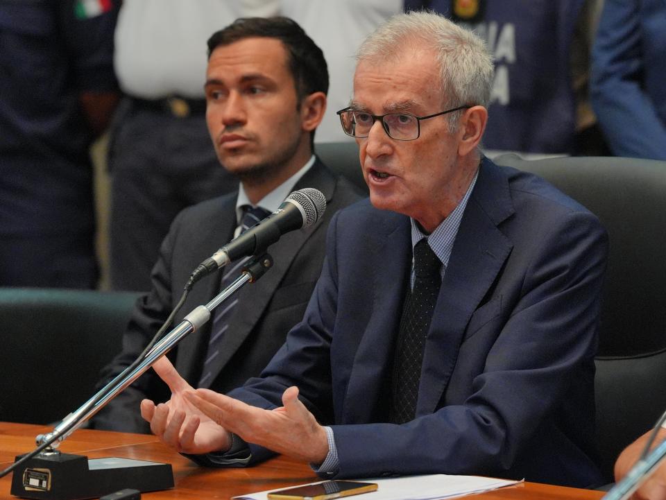 Chief prosecutor Ambrogio Cartosio (right) during a press conference in Termini Imerese (PA Wire)