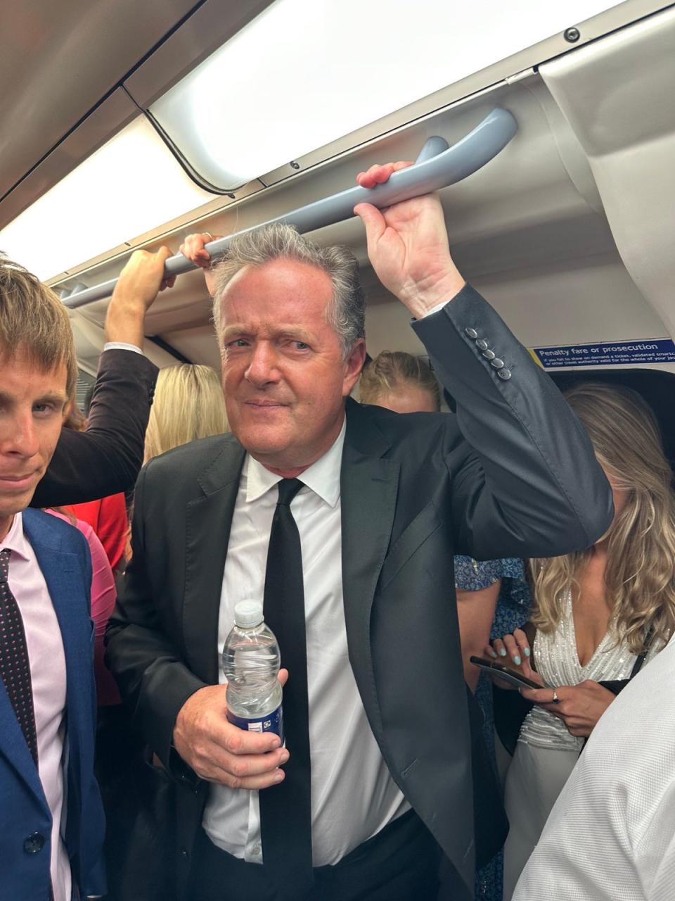 Piers Morgan gets the tube (Piers Morgan Twitter)