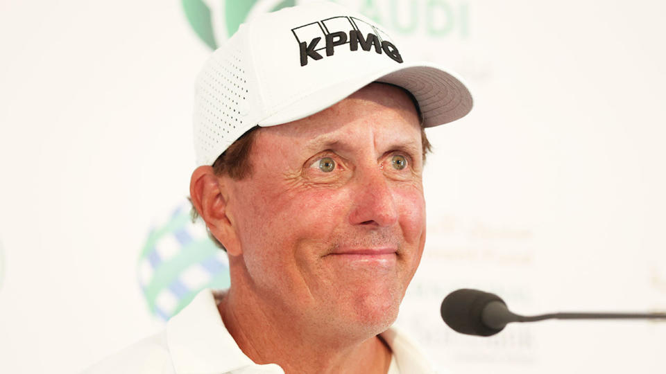 Pictured here, Phil Mickelson speaks to reporters at a golf event in 2022.