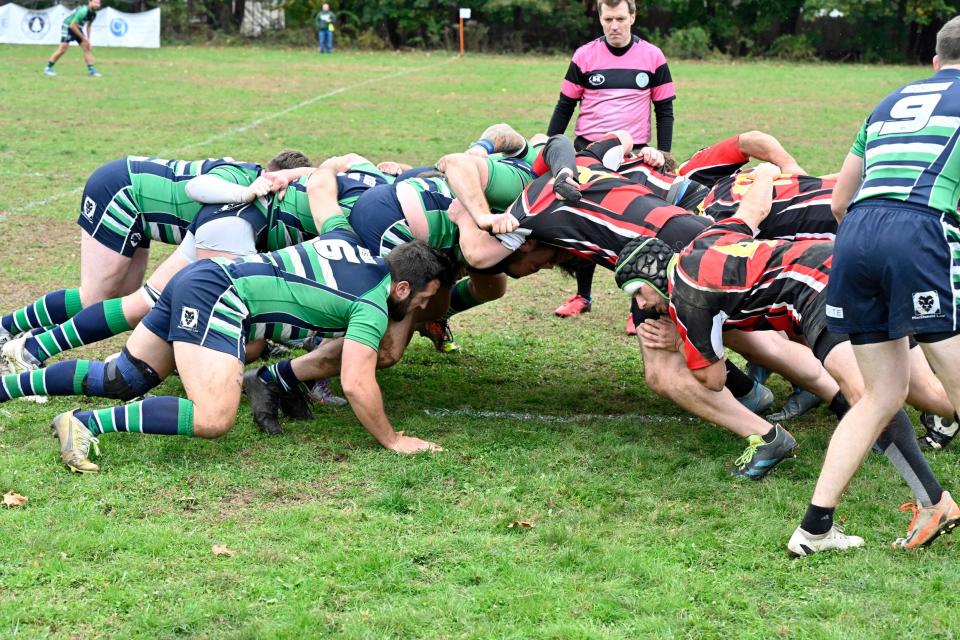 Seacoast Rugby Club forwards engaged in a scrum for possession during the first half of the home semi-final game against Mad River-Stowe Rugby Club.