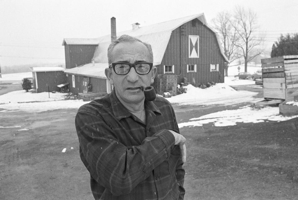 Max Yasgur poses at his farm near Bethel, N.Y. on March 23, 1970.  Yasgur, who rented his farms for the Woodstock Music festival in 1969, received over 3,000 letters from young people who came to the weekend festival, some letters addressed to 