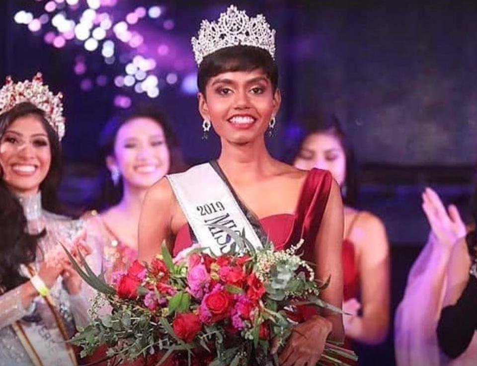 She was crowned Miss Universe Singapore on 17th October 2019, at Zouk, Singapore, and would be representing the country at the Miss Universe pageant this year. The 24-year-old beauty with a distinct pixie-cut holds a degree in biomedical science.