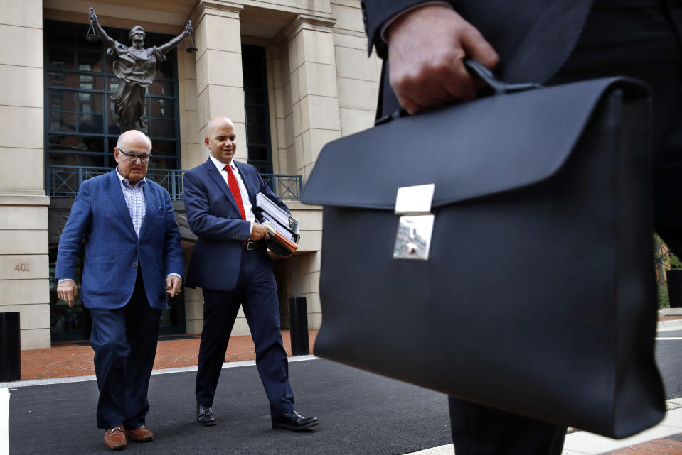 <p>Jay Nanavati, second from left, one of the lawyers for former Donald Trump campaign chairman Paul Manafort, leaves federal court after attending the Manafort trial in Alexandria, Va., Tuesday, Aug. 7, 2018. (Photo: Jacquelyn Martin/AP) </p>