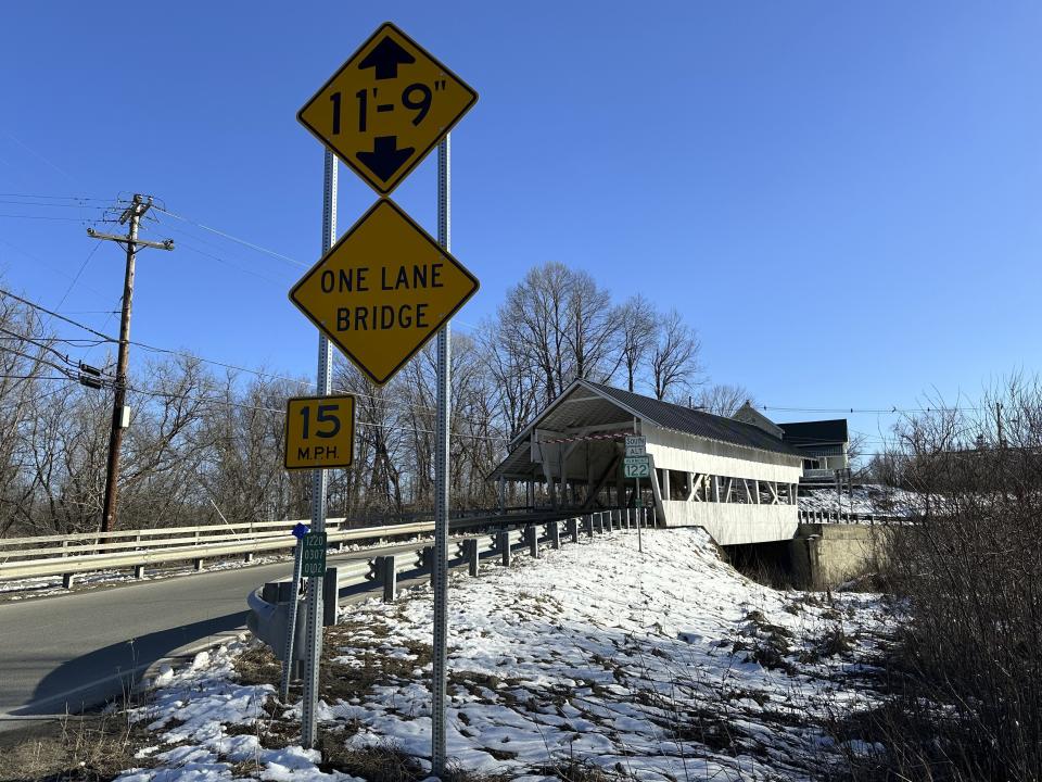 The Miller's Run covered bridge is shown on Tuesday, March 12, 2024 in Lyndon, Vt. The historic bridge is under threat from truck drivers using GPS meant for cars that continually hit the bridge. (AP Photo/Lisa Rathke)