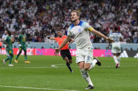 England's Harry Kane celebrates scoring his side's second goal during the World Cup round of 16 soccer match between England and Senegal, at the Al Bayt Stadium in Al Khor, Qatar, Sunday, Dec. 4, 2022. (AP Photo/Frank Augstein)