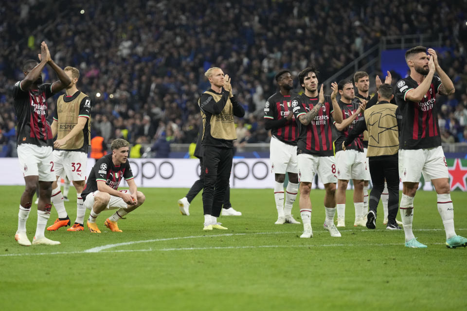 Dejected Inter Milan players greet supporters after the Champions League semifinal second leg soccer match between Inter Milan and AC Milan at the San Siro stadium in Milan, Italy, Tuesday, May 16, 2023. (AP Photo/Antonio Calanni)