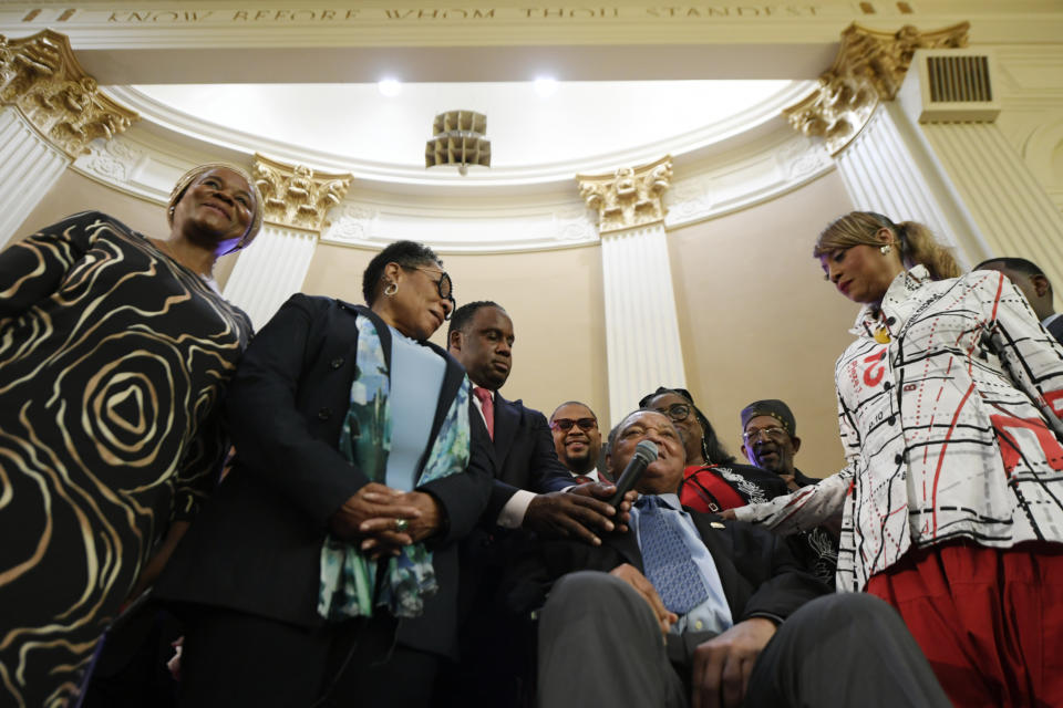 Rev. Jesse Jackson, second form right, speaks while announcing that he is stepping down as the president at Rainbow PUSH Coalition, Saturday, July 15, 2023, in Chicago. (AP Photo/Paul Beaty)