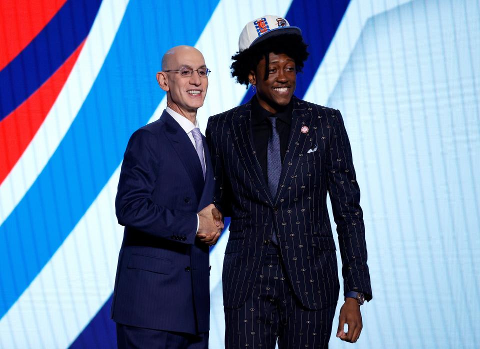 NBA commissioner Adam Silver (left) and Santa Clara's Jalen Williams pose for photos after Williams was drafted with the 12th overall pick by the Oklahoma City Thunder during the 2022 NBA Draft at Barclays Center on Thursday in New York City.