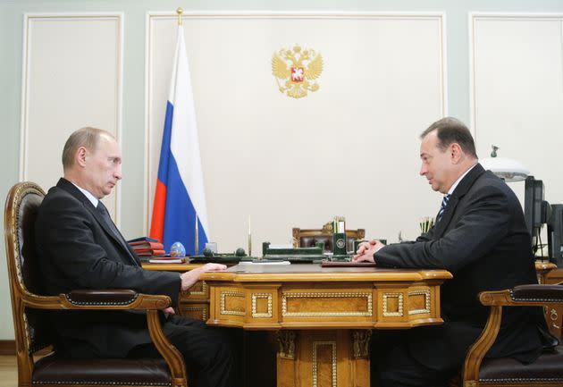 Vladimir Strzhalkovsky is seen with then-Russian Prime Minister Vladimir Putin during a 2011 meeting. (Photo: AFP via Getty Images)