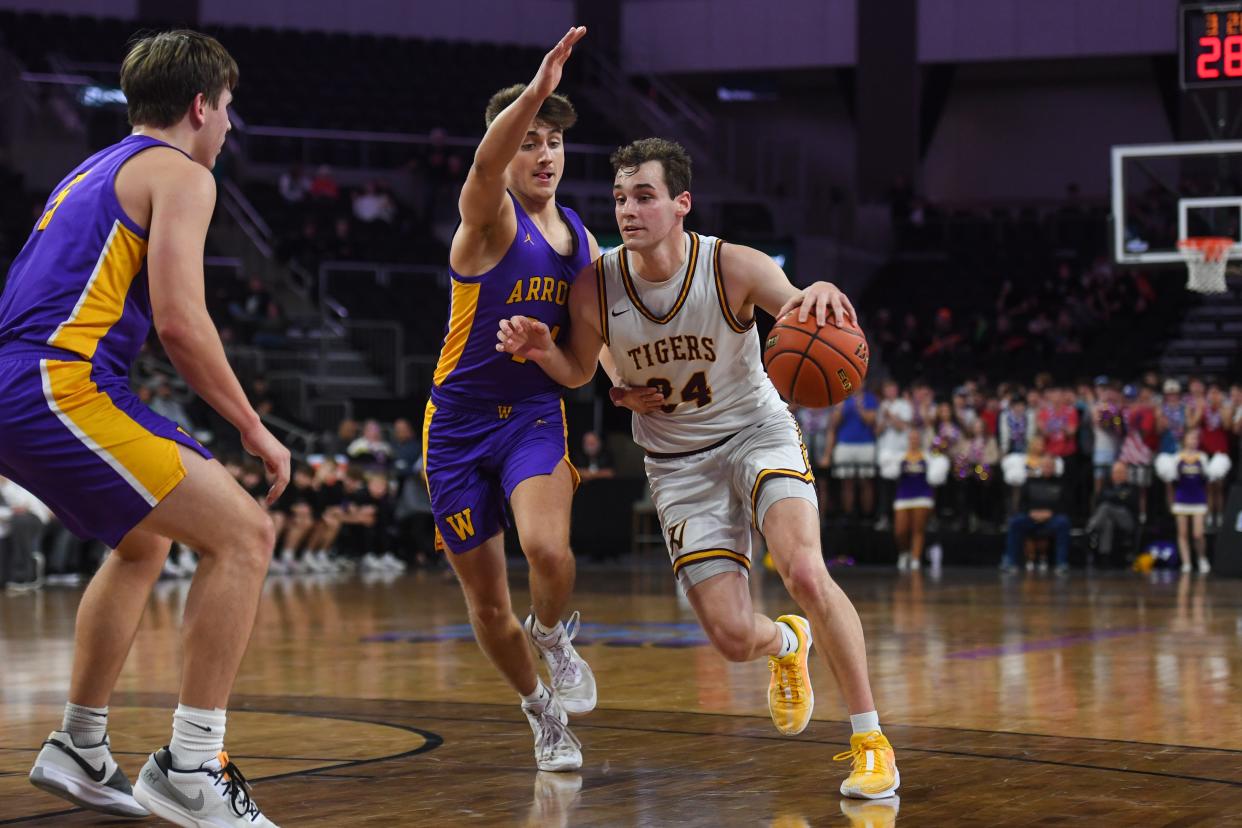 Harrisburg's guard Jacoby Mehrman (24) drives to the basket on Thursday, March 14, 2024 at Denny Sanford Premier Center in Sioux Falls.