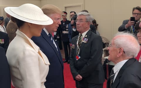 Melania Trump and US President Donald Trump meet veteran Thomas Cuthbert  - Credit: PA