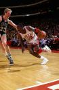 Michael Jordan drives against Boston's Larry Bird during a Bulls-Celtics game in 1985. (Getty Images)