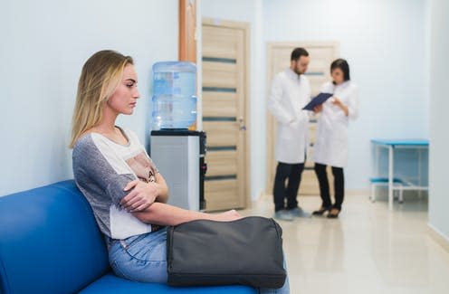 <span class="caption">Many women have to wait years for a diagnosis.</span> <span class="attribution"><a class="link " href="https://www.shutterstock.com/image-photo/young-woman-filling-nervous-sitting-hospital-796833823" rel="nofollow noopener" target="_blank" data-ylk="slk:Roman Kosolapov/ Shutterstock">Roman Kosolapov/ Shutterstock</a></span>