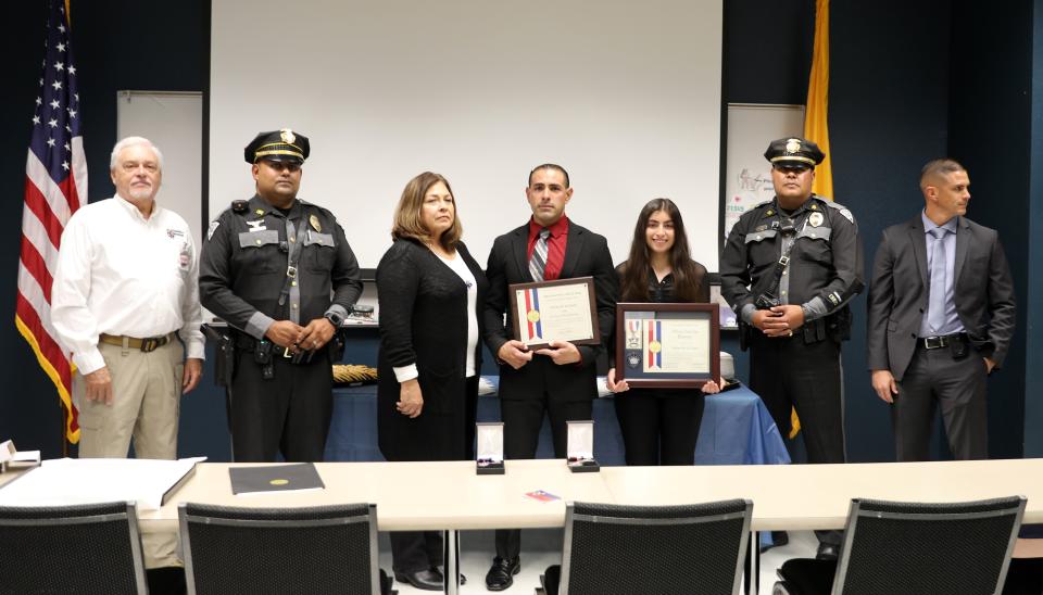 Las Cruces Police Officer Adrian De La Garza, center, earned Silver Star and Purple Heart recognitions for his actions on Feb. 4, 2021.