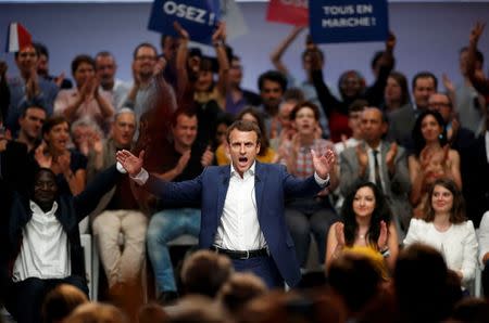 French Economy Minister Emmanuel Macron attends a political rally for his recently launched political movement, En Marche!, or Forward!, in Paris, France, July 12, 2016. REUTERS/Benoit Tessier