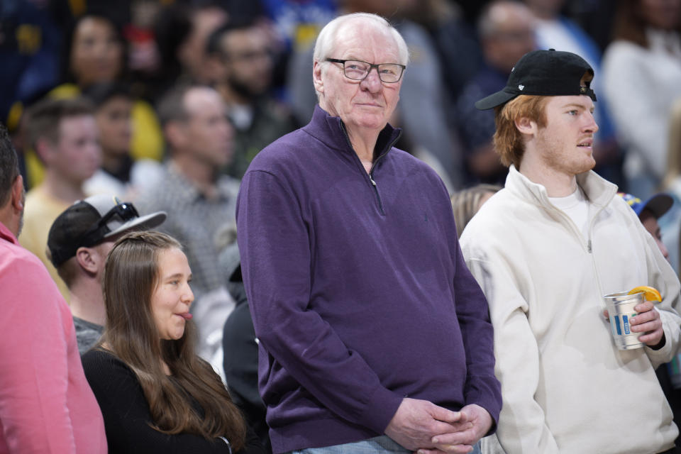 Retired Denver Nuggets center Dan Issel looks on in the first half of an NBA basketball game between the Nuggets and the Brooklyn Net, Sunday, March 12, 2023, in Denver. (AP Photo/David Zalubowski)