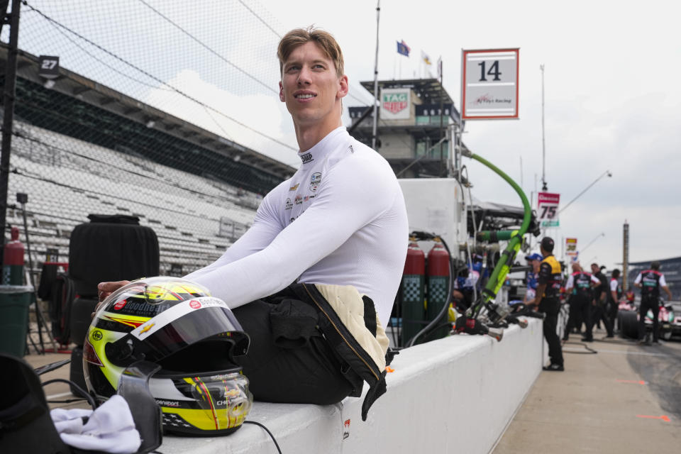 Sting Ray Robb sits on the pit wall during a break during practice for the Indianapolis 500 auto race at Indianapolis Motor Speedway in Indianapolis, Wednesday, May 15, 2024. (AP Photo/Michael Conroy)