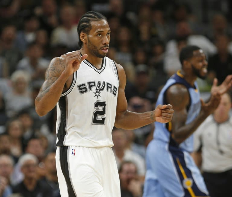 Kawhi Leonard of the San Antonio Spurs reacts after scoring a basket against the Memphis Grizzlies in Game Two of the Western Conference quarter-finals during the 2017 NBA Playoffs, at AT&T Center in San Antonio, Texas, on April 17