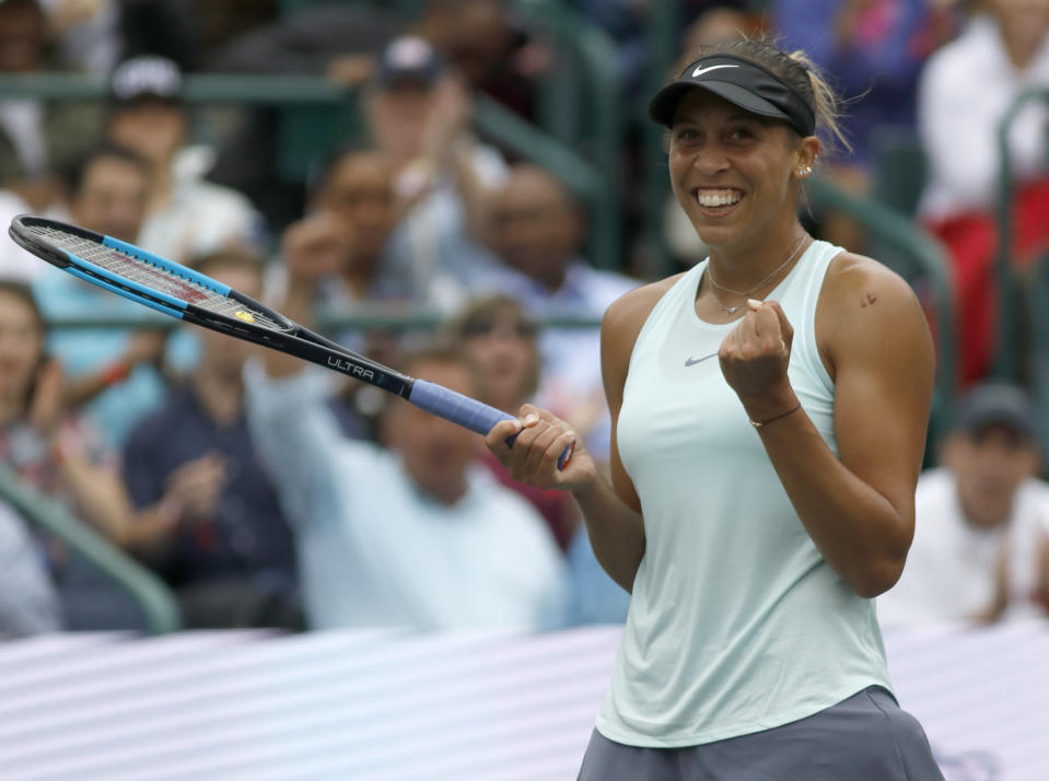 Madison Keys celebrates after defeating Caroline Wozniacki, from Denmark, to win their finals match at the Volvo Car Open tennis tournament in Charleston, S.C., Sunday, April 7, 2019. (AP Photo/Mic Smith)