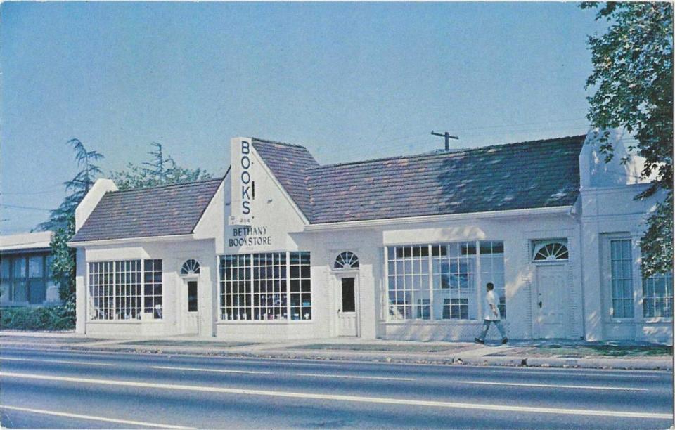 Exterior image of a bookstore with a sign reading "Books"