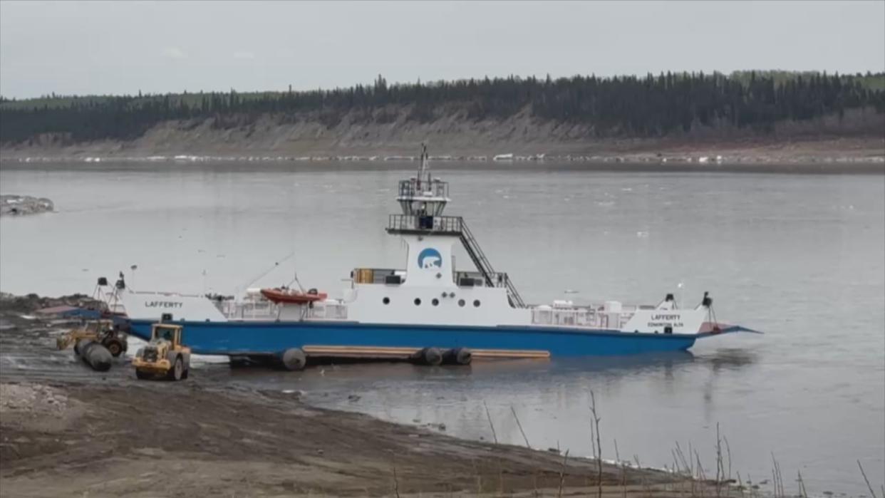 The M.V. Lafferty in Fort Simpson, N.W.T. launching into the Liard River Tuesday. Fort Simpson's mayor is concerned that low water levels could lead to the ferry closing at points during the summer. (Jonathan Antoine - image credit)