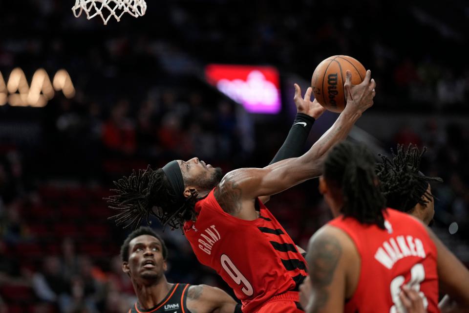 Portland Trail Blazers small forward Jerami Grant (9) is fouled while shooting by Detroit Pistons guard Stanley Umude (17, not pictured) during the second half at Moda Center in Portland, Oregon, on Thursday, Feb. 8, 2024.