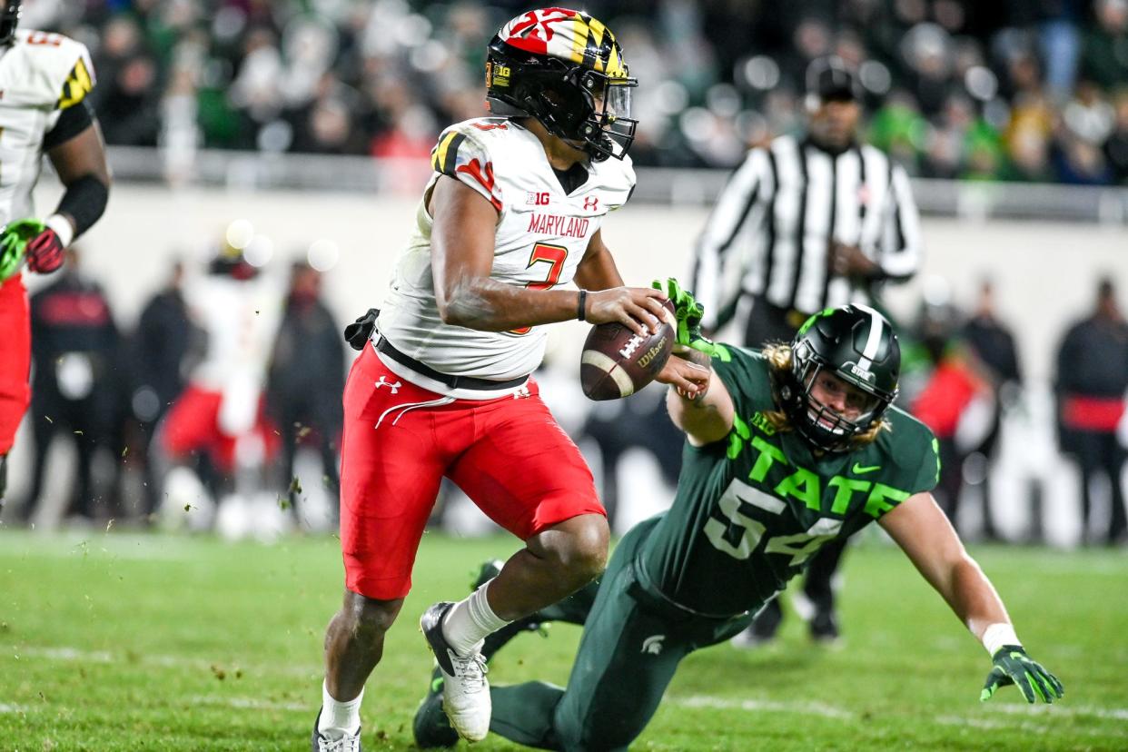 Michigan State's Kyle King pressures Maryland's Taulia Tagovailoa during the fourth quarter on Saturday, Nov. 13, 2021, at Spartan Stadium in East Lansing.