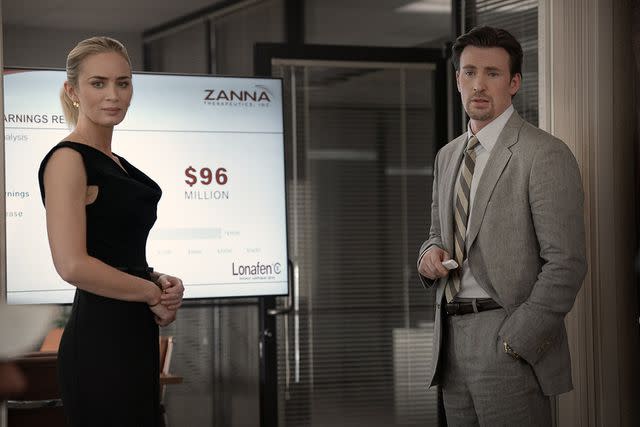 <p>Brian Douglas/Netflix Â© 2023</p> (L to R) Emily Blunt as Liza and Chris Evans as Brenner in Pain Hustlers