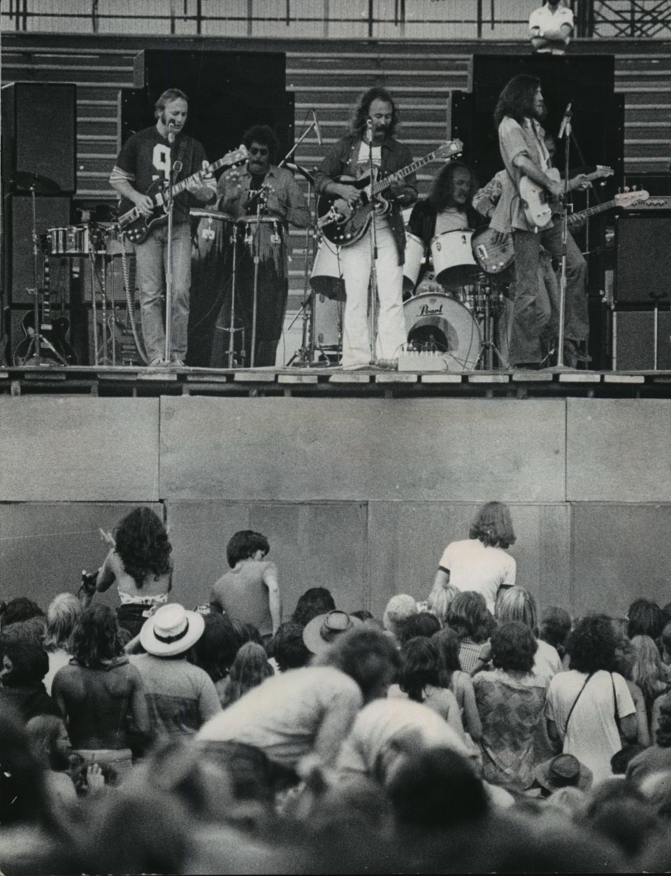Crosby, Stills, Nash & Young take the stage at County Stadium before about 52,000 people on July 21, 1974.