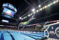 Jun 29, 2016; Omaha, NE, USA; Michael Phelps enters the water during the men's 200 meter butterfly final in the U.S. Olympic swimming team trials at CenturyLink Center. Mandatory Credit: Rob Schumacher-USA TODAY Sports