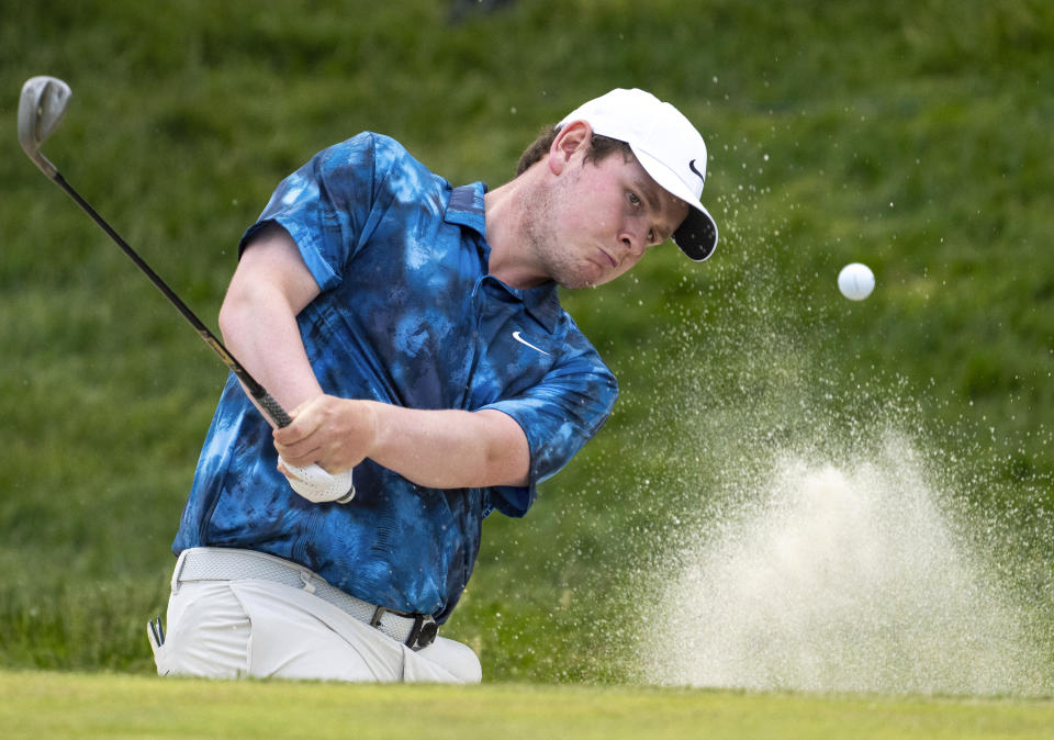 Robert MacIntyre, of Scotland, hits out of a bunker on the eighth hole during the third round of Canadian Open golf tournament in Hamilton, Ontario, Saturday, June 1, 2024. (Frank Gunn/The Canadian Press via AP)