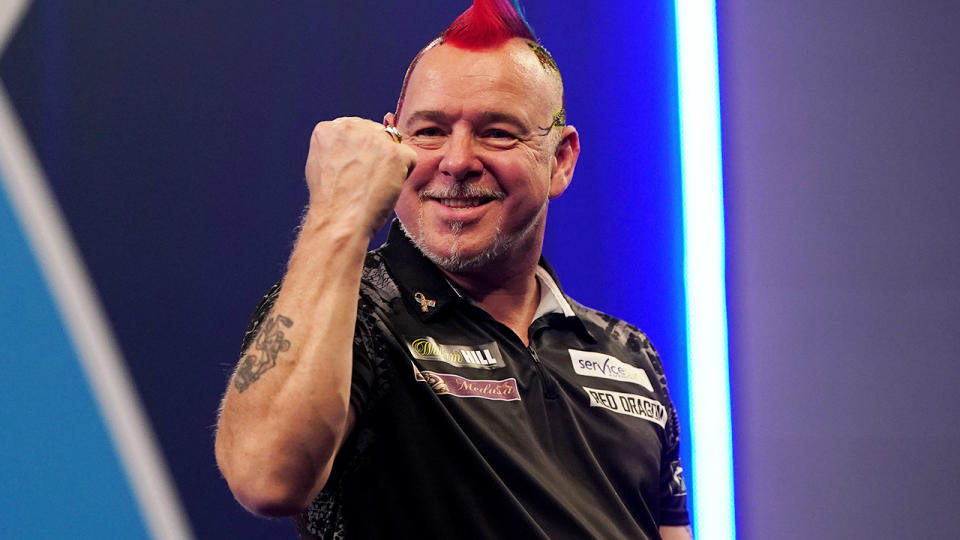 Peter Wright, pictured here celebrates his victory over Gerwyn Price.