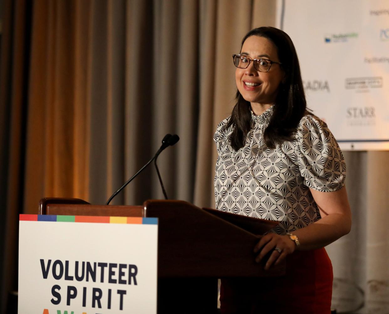 Jeanette Gisbert, Executive Director of Volunteer New York!, delivers remarks as Volunteer New York! held their 44th Annual Volunteer Spirit Awards, presented by Regeneron, at the Westchester Marriott in Tarrytown, April 12, 2024.