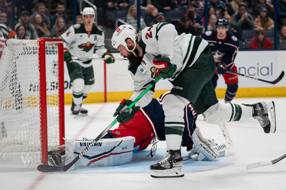Jan 6, 2024; Columbus, Ohio, USA;
Minnesota Wild defenseman Zach Bogosian (24) attempts to score a goal but is blocked by Columbus Blue Jackets goaltender Daniil Tarasov (40) during the overtime of their game against the Minnesota Wild on Saturday, Jan. 6, 2024 at Nationwide Arena.
