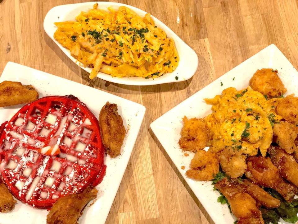 An Aunt Bungie Chicken & Red Waffle combo, lobster mac, fried shrimp, Parmesan wings from Cuzzo’s Cuisine.