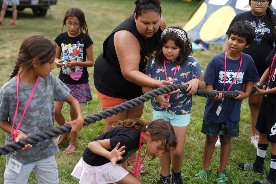 Kids prepare to play tug of war during the South Dakota Urban Indian Health summer culture camp in Sisseton.