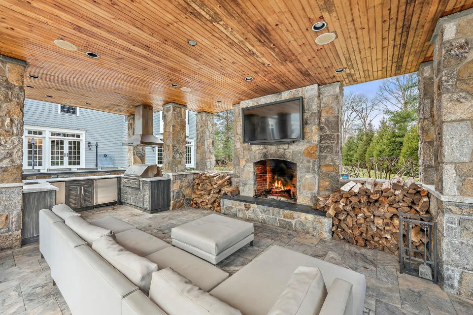 The rustic outdoor kitchen at 12 Mountain Wood Drive.