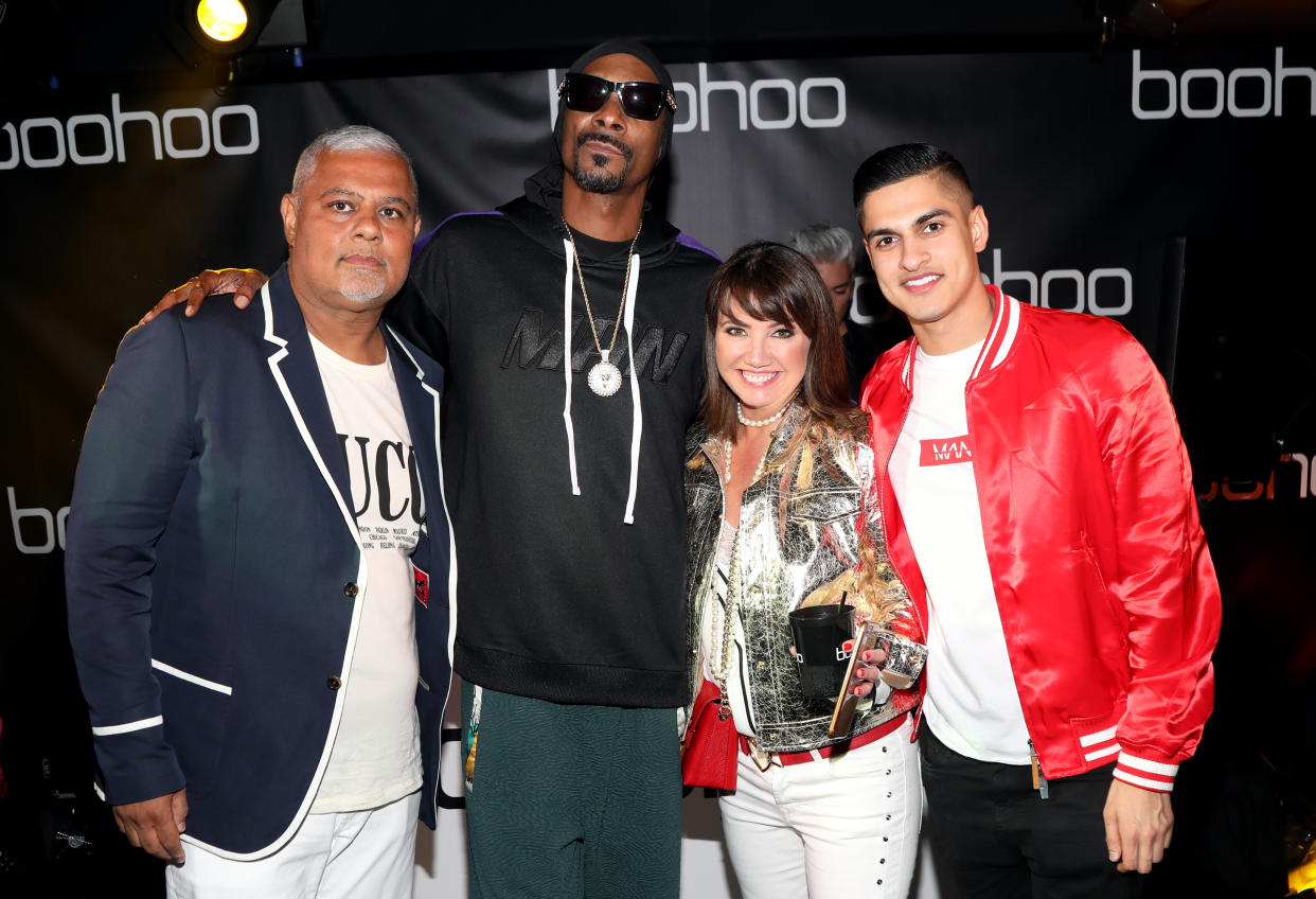 HOLLYWOOD, CA - MARCH 21:  (L-R) Mahmud Kamani, Snoop Dogg Carol Kane and Samir Kamani attend the launch of the boohoo.com spring collection and the Zendaya Edit at The Highlight Room at the Dream Hollywood on March 21, 2018 in Hollywood, California.  (Photo by Jerritt Clark/Getty Images for bohooo)