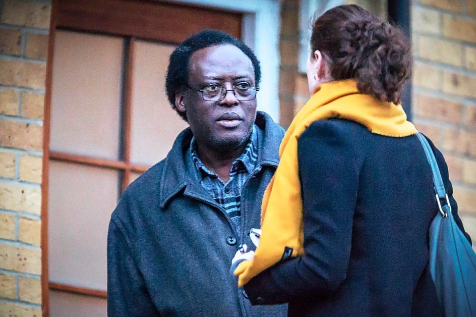 Reporter Amy-Clare Martin approaches suspect Celestin Mutabaruka in 2019 (Mirrorpix)