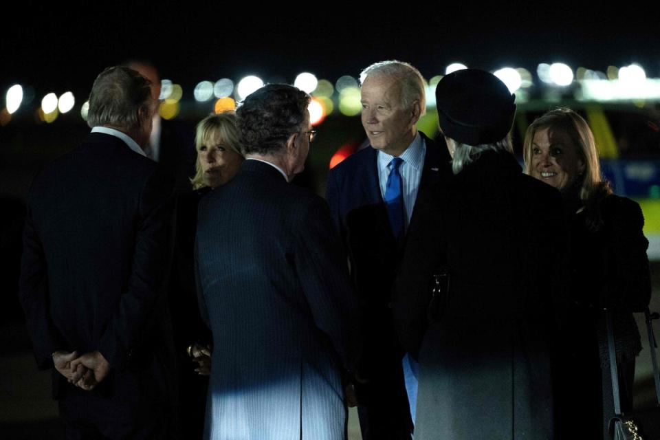 US ambassador Jane Hartley greets the Bidens as they step off Air Force One at Stansted Airport (AFP via Getty Images)