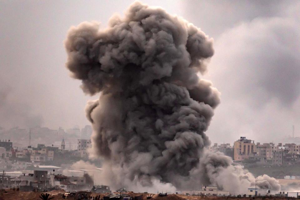 This picture taken on Nov. 12, 2023 from a position along the border with the Gaza Strip in southern Israel shows a smoke plume erupting during Israeli bombardment on the Palestinian enclave amid ongoing battles.