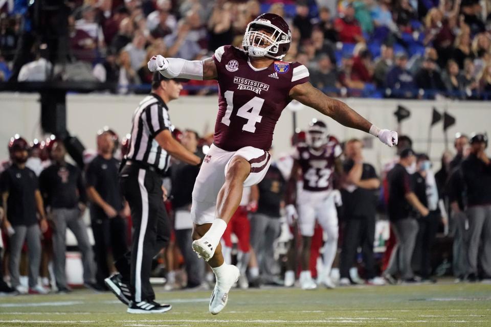 Mississippi State linebacker Nathaniel Watson celebrates after sacking Texas Tech quarterback Donovan Smith in the first half of the Liberty Bowl NCAA college football game Tuesday, Dec. 28, 2019, in Memphis, Tenn. (AP Photo/Mark Humphrey) ORG XMIT: TNMH114