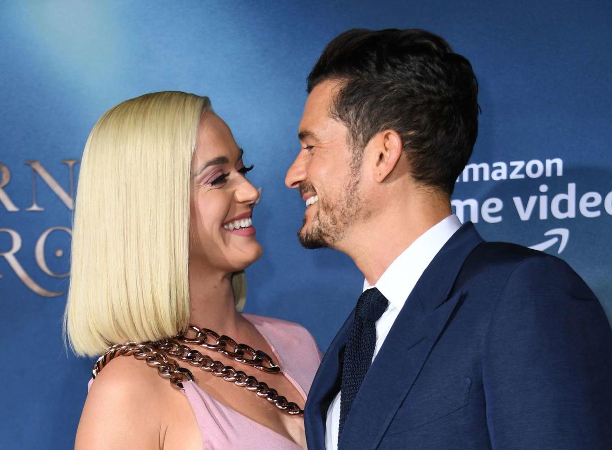 British actor Orlando Bloom and US singer/songwriter Katy Perry arrive for the Los Angeles premiere of Amazon Original Series "Carnival Row" at the TCL Chinese theatre on August 21, 2019 in Hollywood