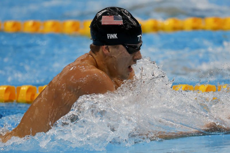 Nic Fink won the 100-meter breaststroke to qualify for Team USA at Paris 2024. File Photo by Tasos Katopodis/UPI