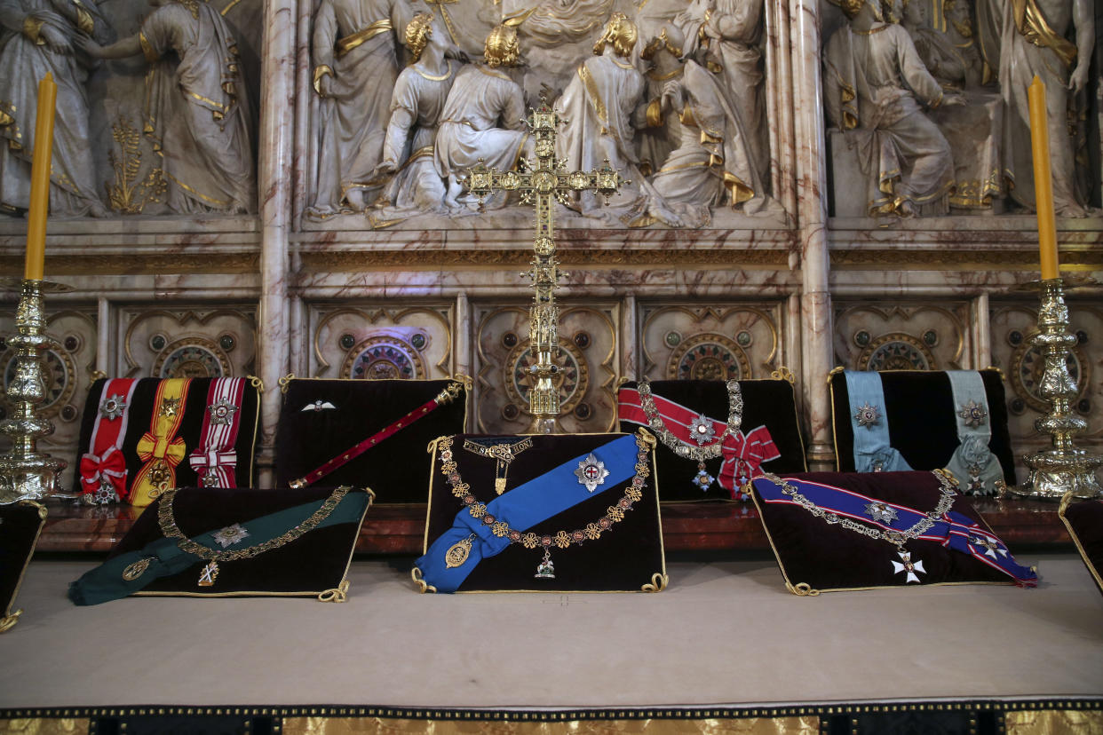 WINDSOR, ENGLAND - APRIL 17: The insignia belonging to Prince Philip, Duke of Edinburgh is placed on the altar at St George's Chapel ahead of the funeral of Prince Philip, Duke of Edinburgh on April 17, 2021 in Windsor, England. Prince Philip of Greece and Denmark was born 10 June 1921, in Greece. He served in the British Royal Navy and fought in WWII. He married the then Princess Elizabeth on 20 November 1947 and was created Duke of Edinburgh, Earl of Merioneth, and Baron Greenwich by King VI. He served as Prince Consort to Queen Elizabeth II until his death on April 9 2021, months short of his 100th birthday. His funeral takes place today at Windsor Castle with only 30 guests invited due to Coronavirus pandemic restrictions. (Photo by Steve Parsons - WPA Pool/Getty Images)