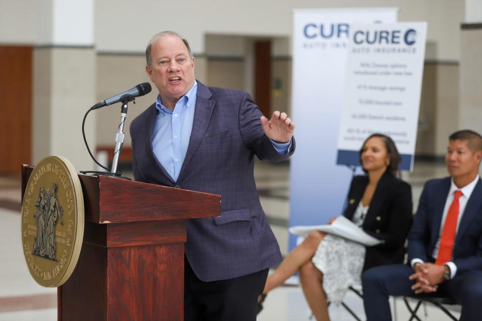 Detroit Mayor Mike Duggan talks about changing the high auto insurance in Detroit at the ribbon cutting for the new offices of CURE Auto Insurance near downtown Detroit on Wednesday, Aug. 30, 2023. CURE is the fastest-growing auto insurer in Michigan that doesn’t use credit scoring, with most of their customers being Detroiters.