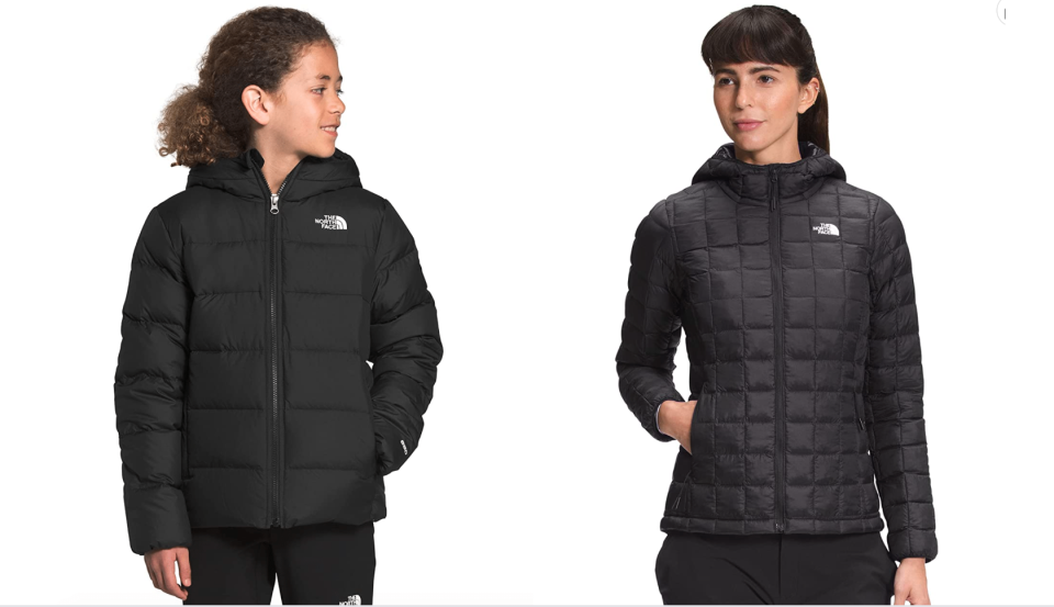 A teenager and a woman wearing black Down jackets from The North Face 