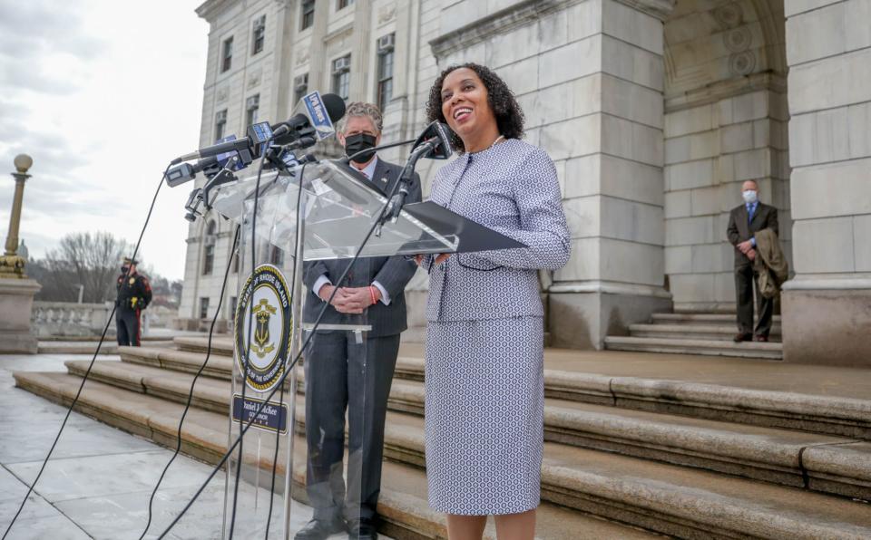 Sabina Matos appears with Rhode Island Gov. Dan McKee, who has named Matos as his pick for lieutenant governor. McKee held that role until former Gov. Gina Raimondo departed for a role in President Joe Biden's Cabinet.